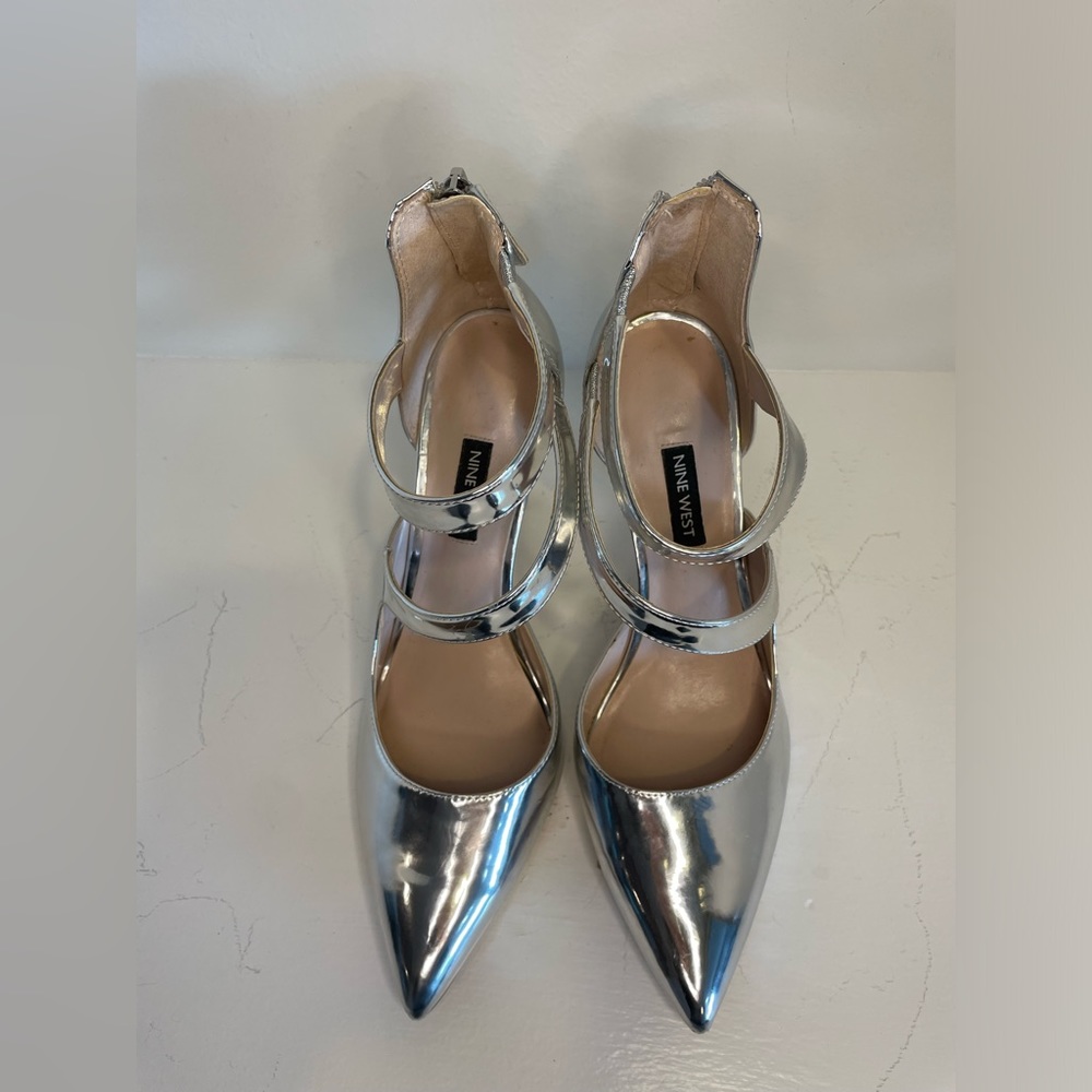 Nine West chrome silver pumps